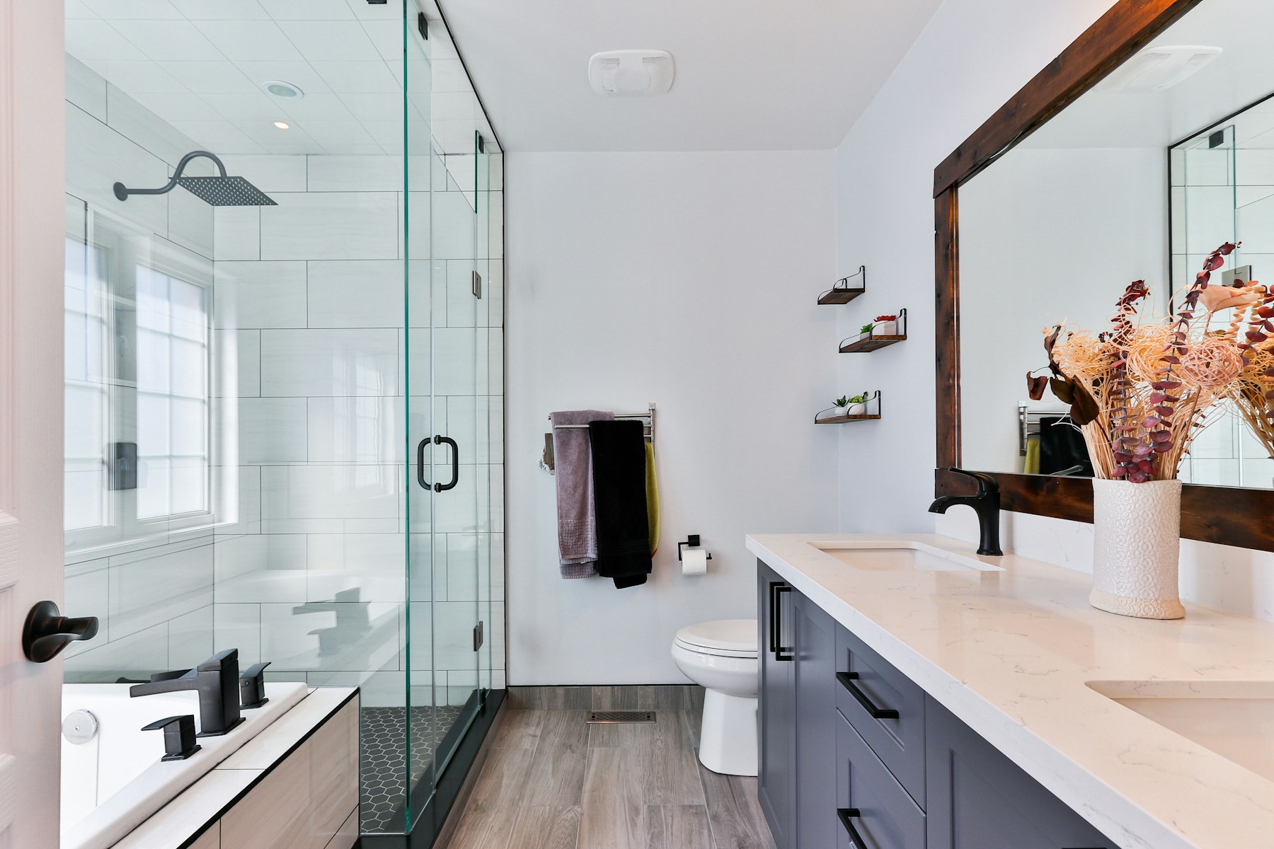 Finished bathroom with shower and vanity
